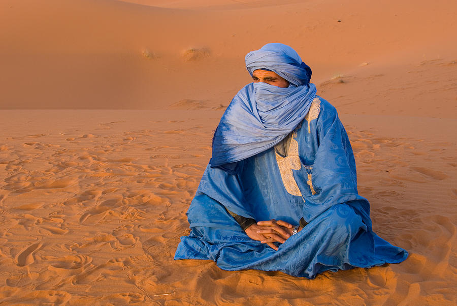 veiled-tuareg-man-sitting-cross-legged-panoramic-images (1).jpg